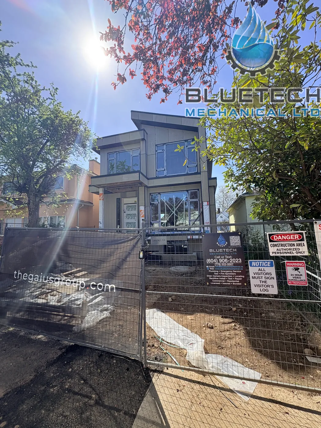 New home construction project with Bluetech Mechanical site fencing